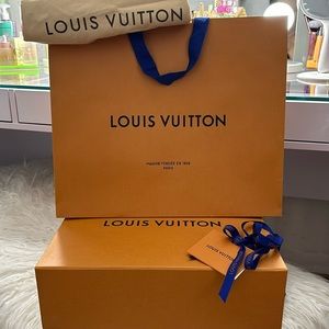 Louis Vuitton gift box, dust bag, ribbon and shopping bag.